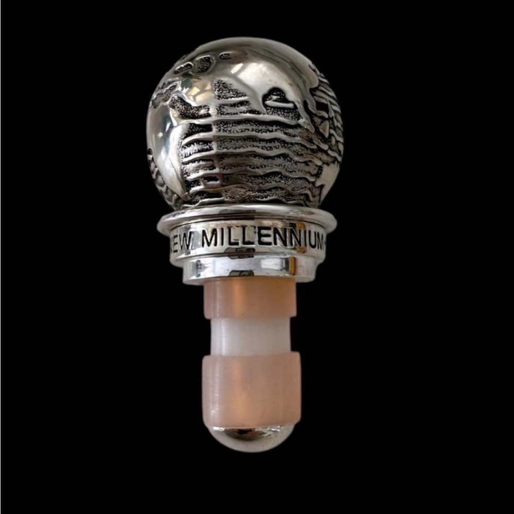 1999 NEIMAN MARCUS SILVER BOTTLE STOPPER GLOBE TO COMMEMORATE THE NEW MILLENIUM